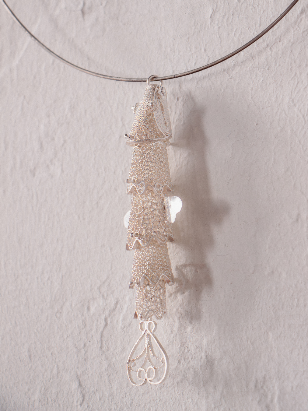 Photo of a fish charm (jewelry)