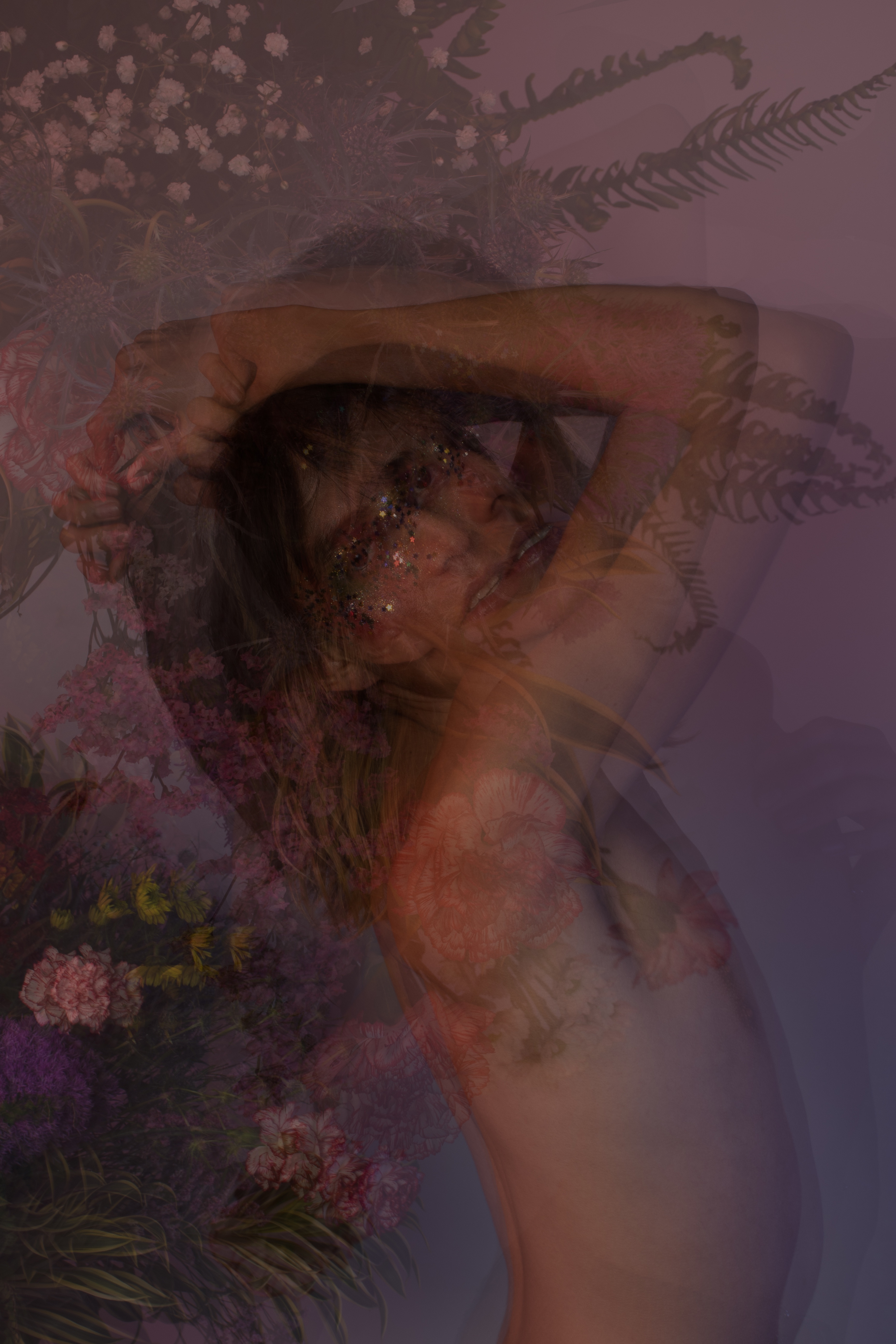 Blurry artistic portrait of a person overlaid with soft textures and colors.